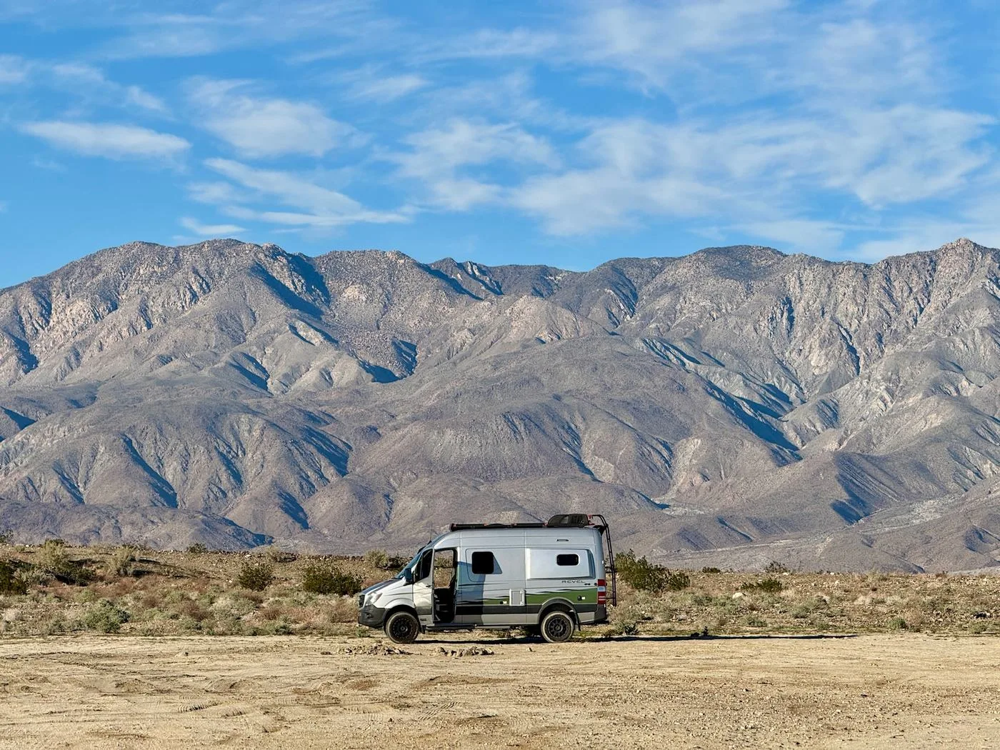 PourHouse beneath the desert mountains
